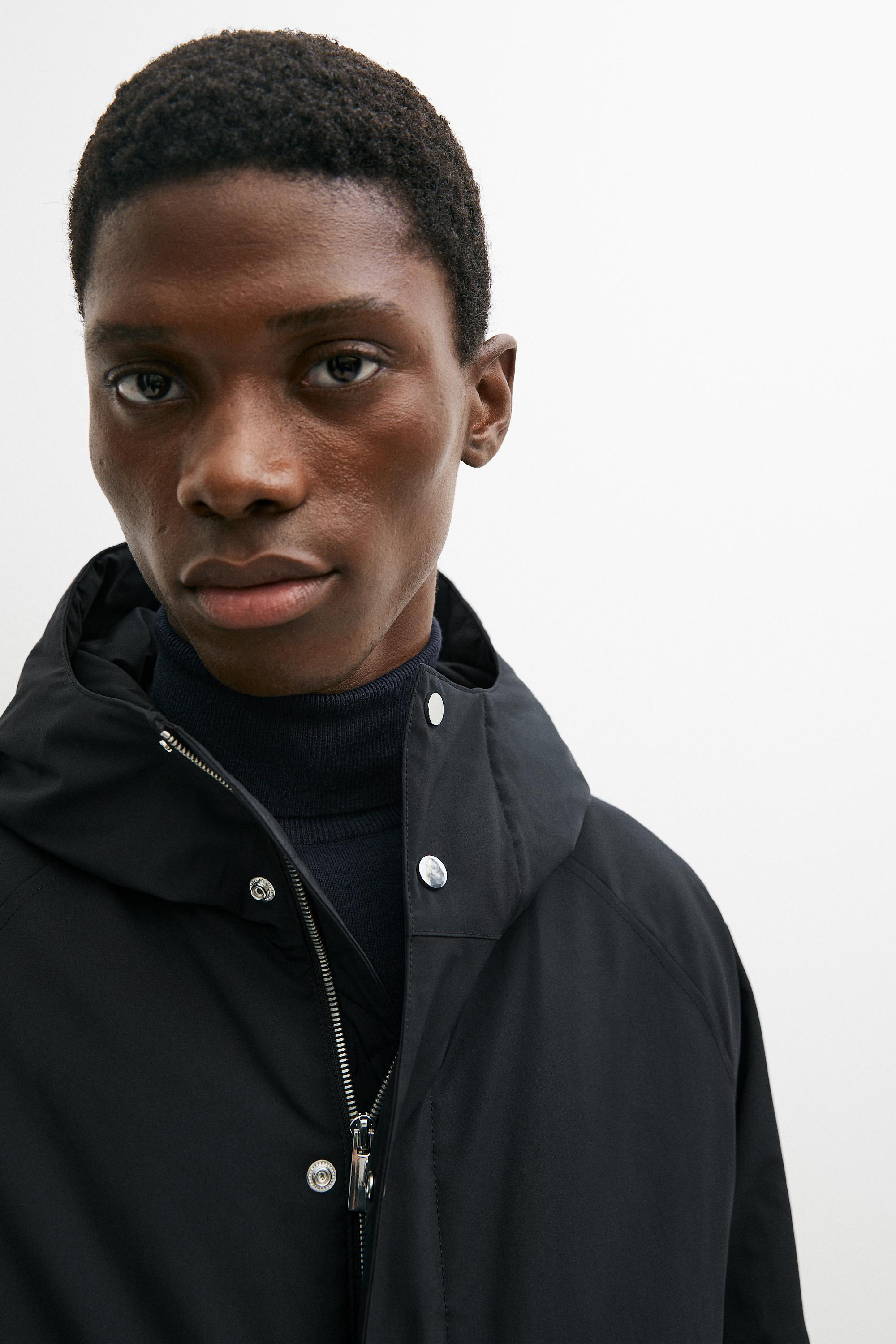 Short quilted parka with pocket details